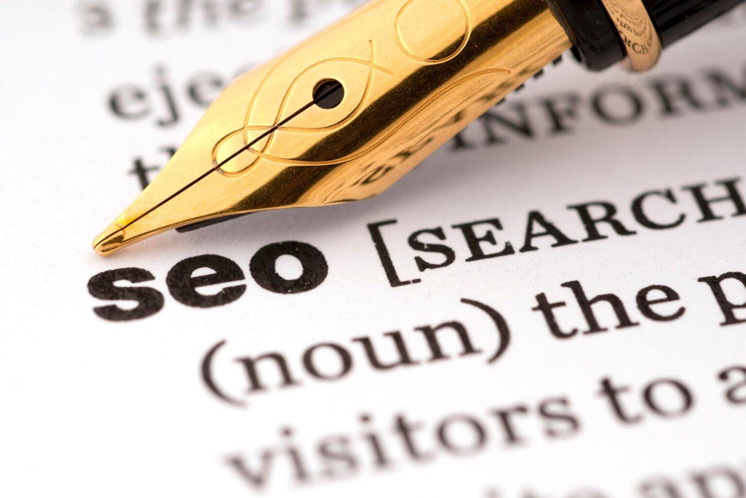 Link building 2 Słownikowa definicja SEO na kartce