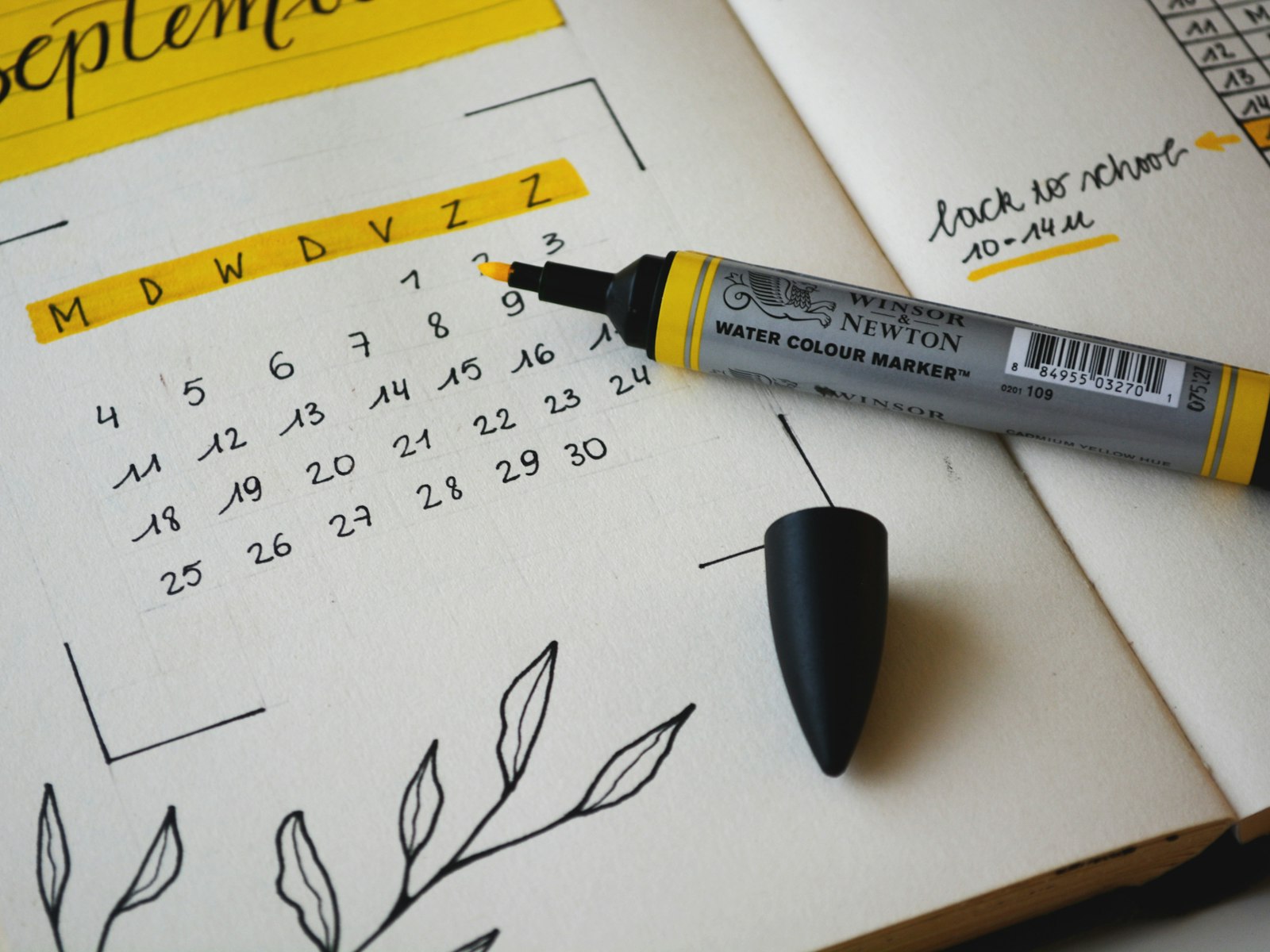 Notes z planem publikacji i marker